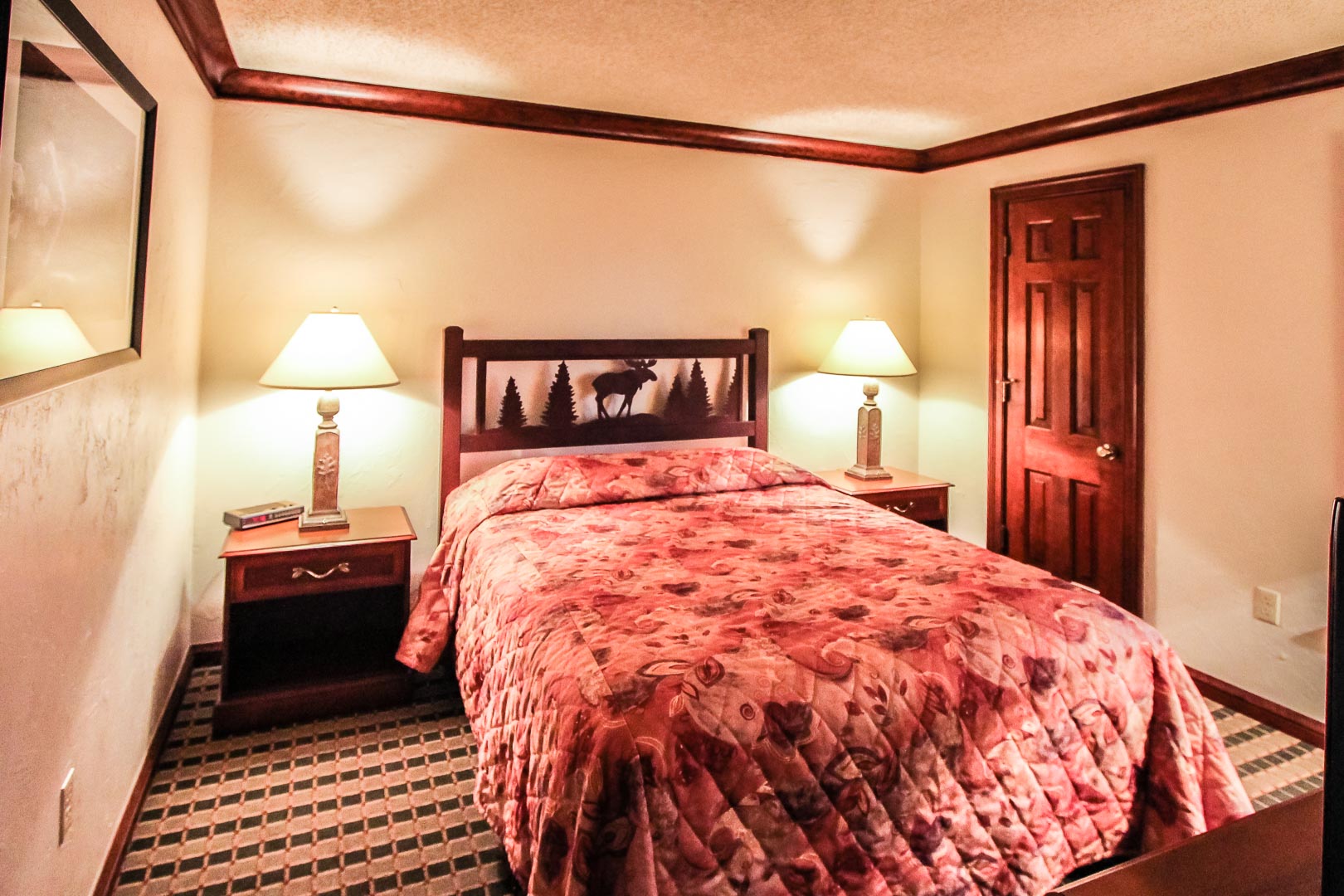 A spacious master bedroom at VRI's Sunburst Resort in Steamboat Springs, Colorado.